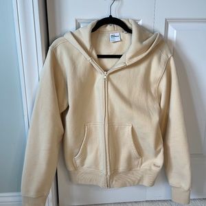 Aritzia TNA zip hoodie in soft yellow